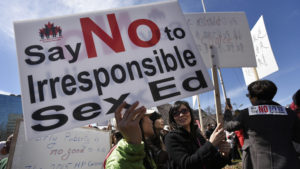 Thousands of people gathered outside the Ontario Legislature on April 14 2015, to protest the provincial government's proposed sex ed curriculum. The majority of protesters (predominantly Chinese and Muslim) arrived in a convoy of school busses